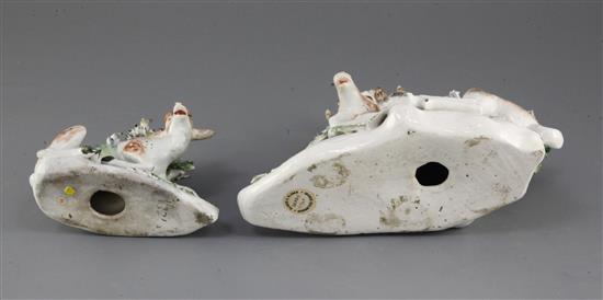 Two Derby porcelain models of recumbent stags, c.1765, 18cm and 11.5cm, some losses and slight restoration